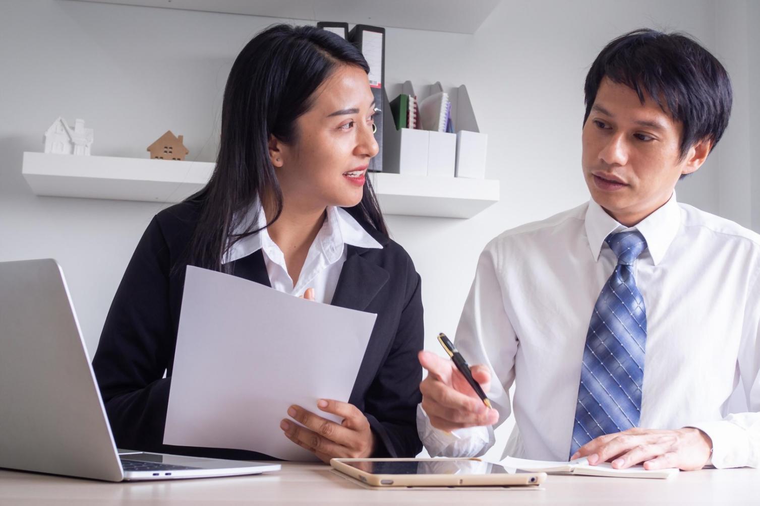 Professional workshop environment showing collaborative financial planning session